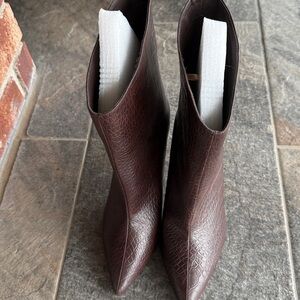 Chocolate Brown Snake Print Booties NWT Women’s 8.5
New without tags -  Express